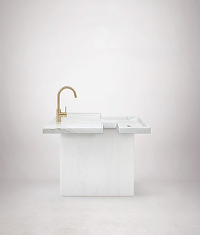 cuba esculpida em pedra com bancada colada