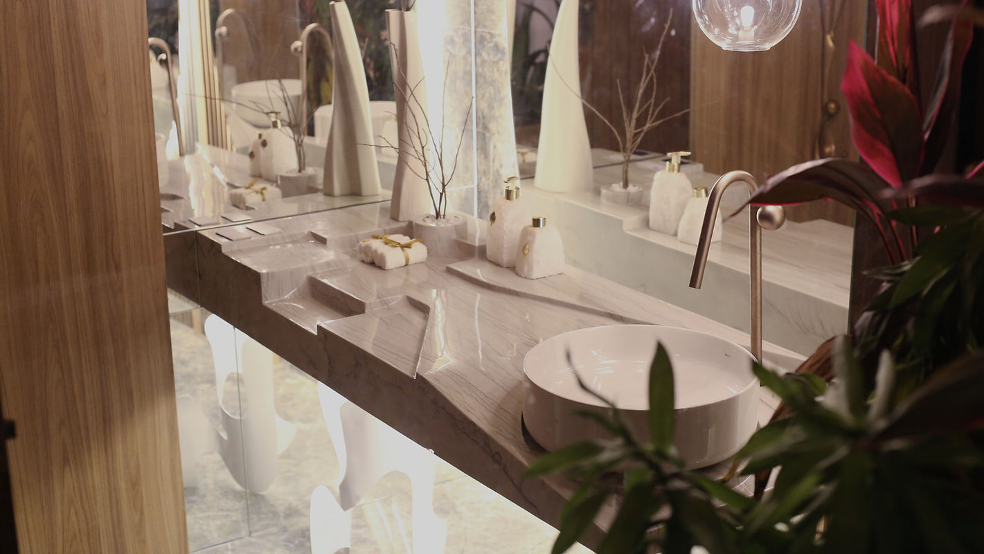 Cuba com bancada esculpida em pedra