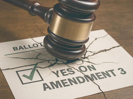 A judge's gavel smashes a ballot