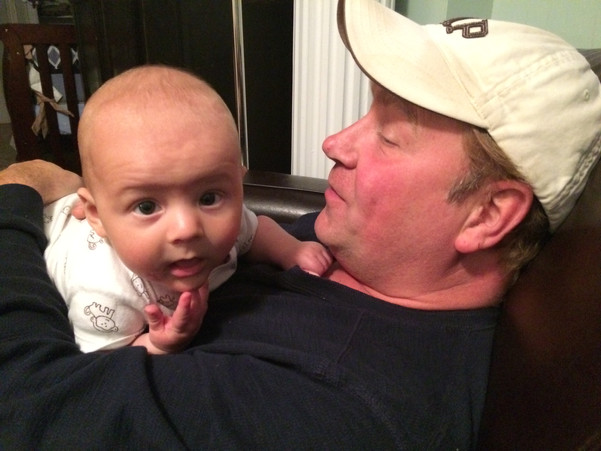Rowan with Daddy at about three months.