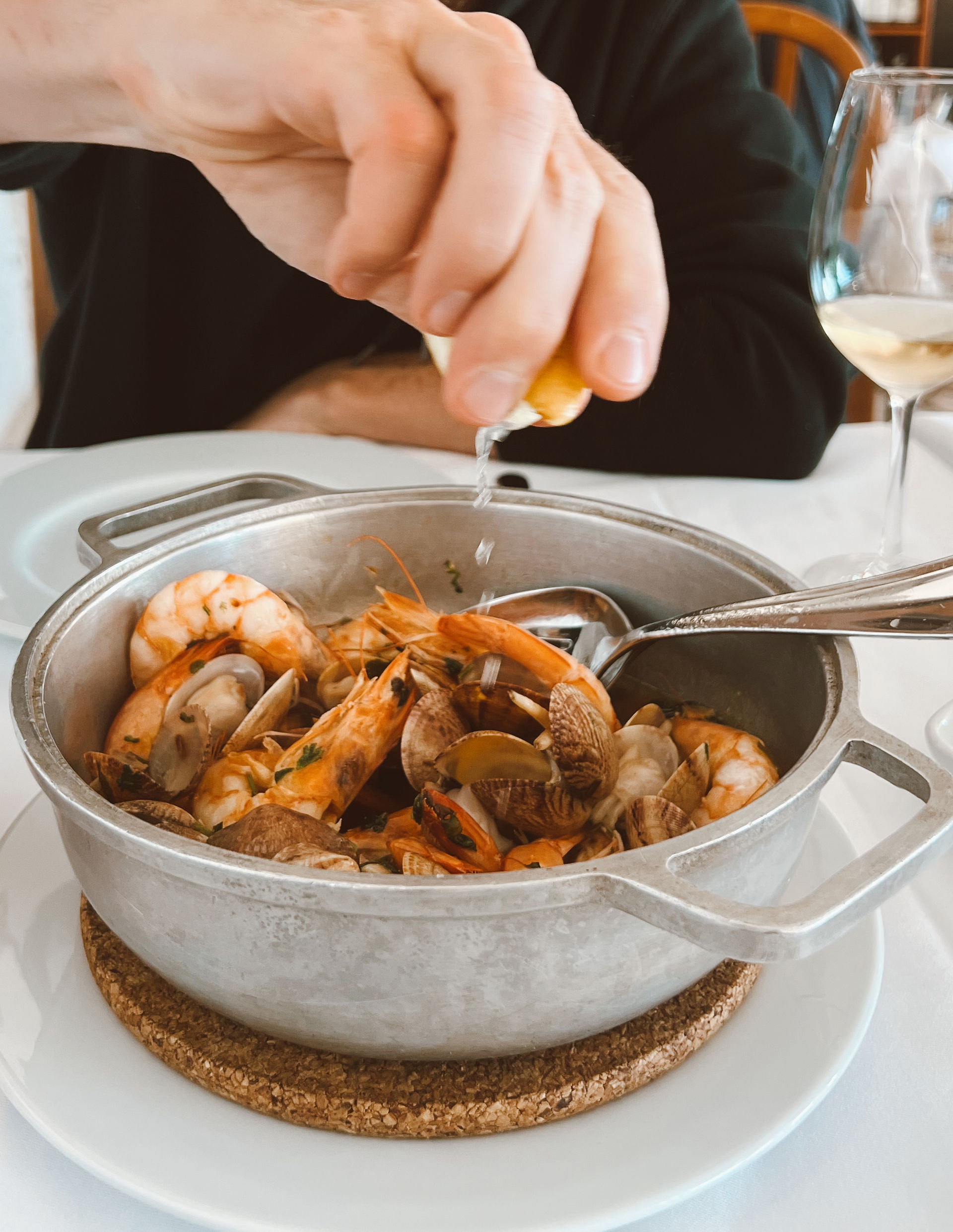 Shrimp and Clams in Tomato Broth traditional plating