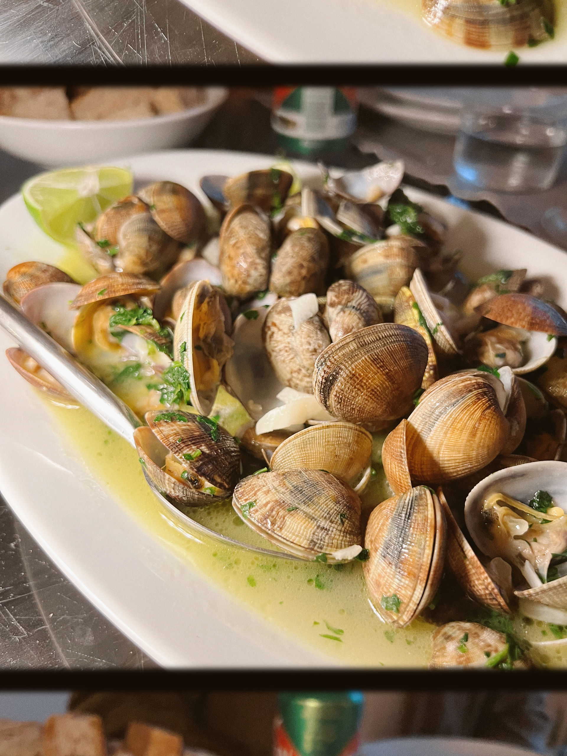 clams in garlic and herb broth