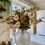 Thumbnail: cream rose and orchid arrangement