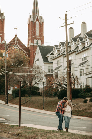 Jeremy and Shelby smiling during their fairytale engagement session in downtown Macon captured by a Macon Georgia engagement photographer