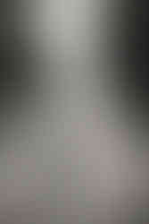 Jeremy and Shelby smiling during their fairytale engagement session in downtown Macon captured by a Macon Georgia engagement photographer