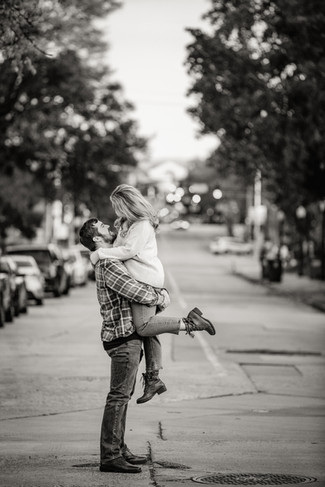 Jeremy and Shelby smiling during their fairytale engagement session in downtown Macon captured by a Macon Georgia engagement photographer