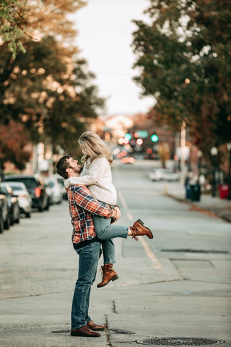 Jeremy and Shelby smiling during their fairytale engagement session in downtown Macon captured by a Macon Georgia engagement photographer
