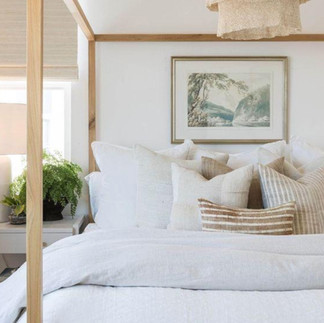 cozy bedroom, neutral home, inspired guest bedroom, olive tree, neutral bedding, cozy home decor, organic, modern, neutral, inspired, white with wooden accents, coastal, wooden canopy bed, plants, pure salt interiors