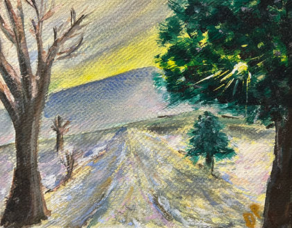 road into distance with two trees