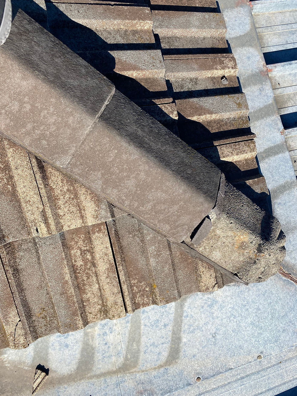 Cracked and broken tiles and pointing.