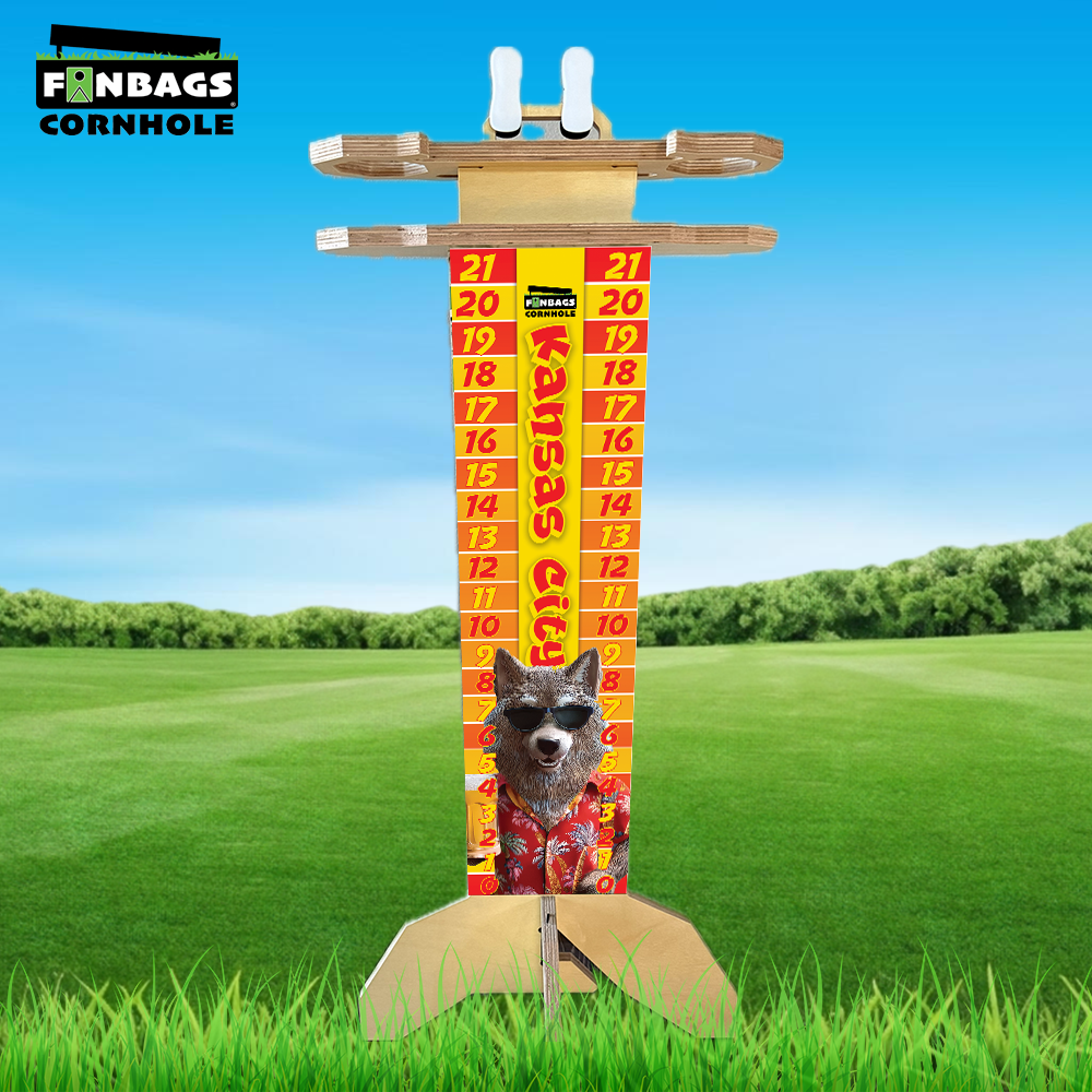 a single cornhole score keeper sitting in grass with a football designs directly printed into the wood