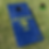 a set of cornhole boards sitting in grass with a state flag