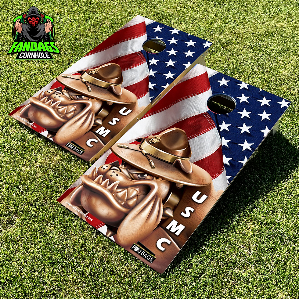 a set of cornhole boards sitting in grass with a marines design