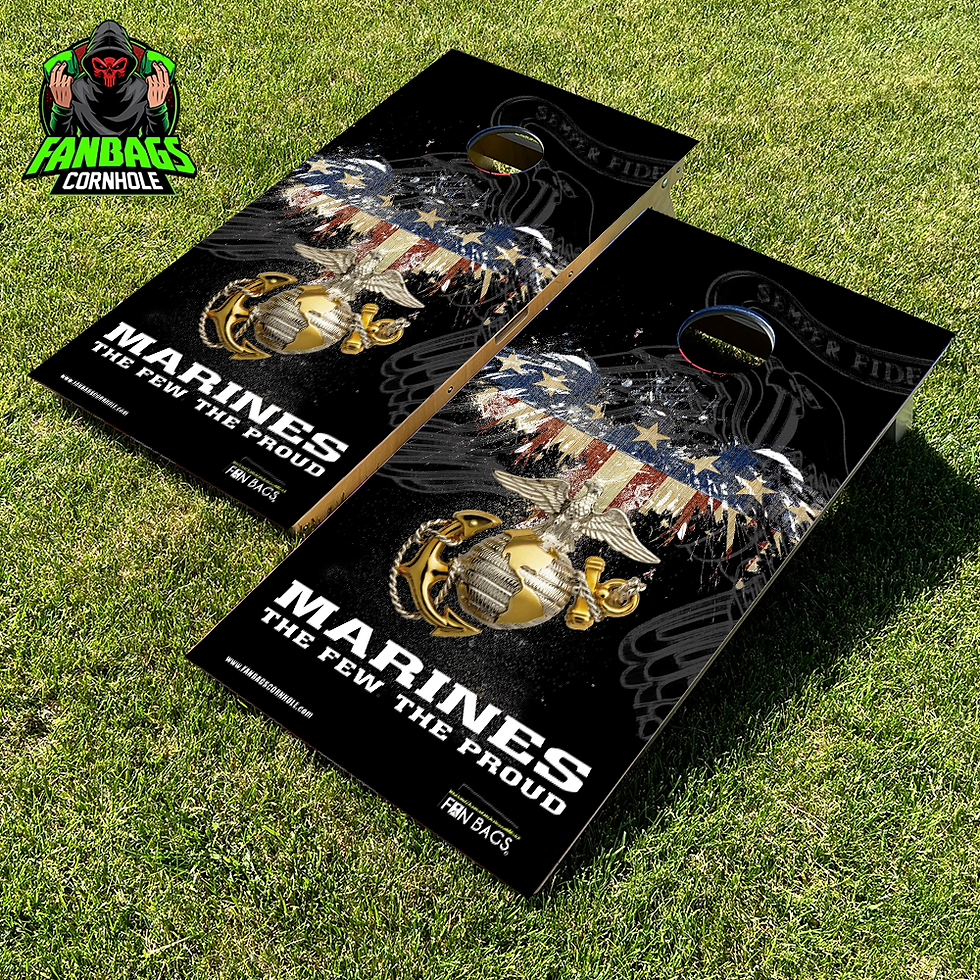 a set of cornhole boards sitting in grass with a us marines design