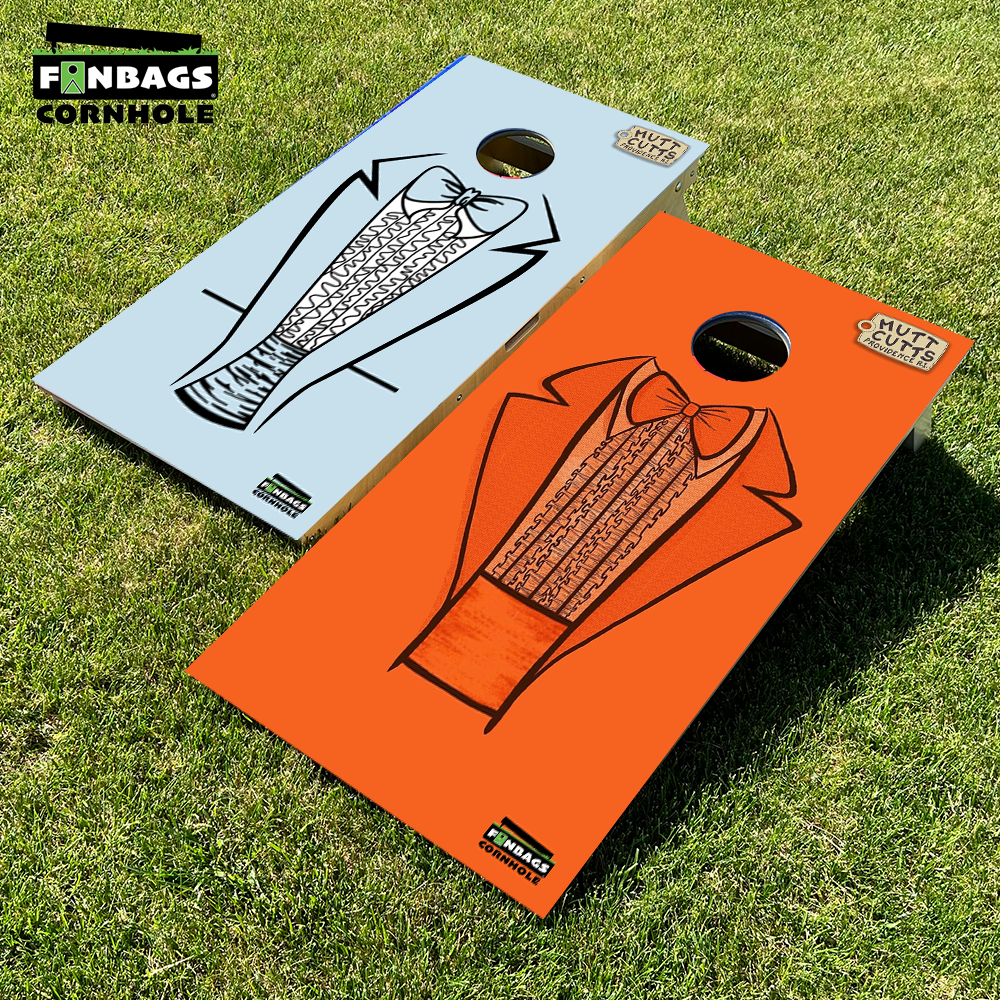 a set of cornhole boards featuring an orange tuxedo design on one board, and a blue tuxedo design on the second board.