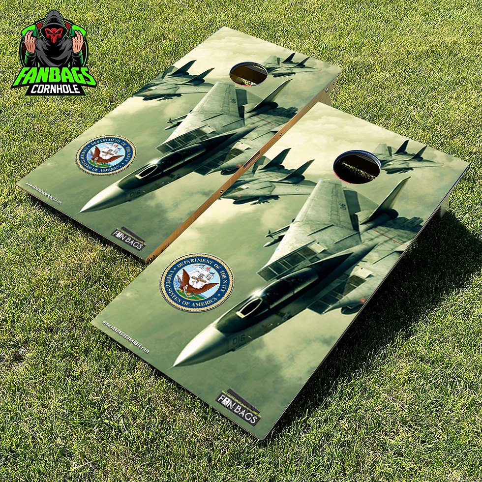 a set of cornhole boards sitting in grass with an F14 navy design