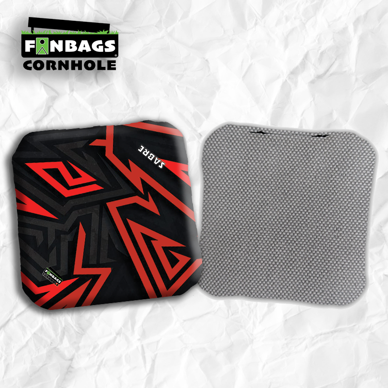 Set of four SABRE pro style cornhole bags featuring a dual-speed design, with a customizable fast fabric side and a professio