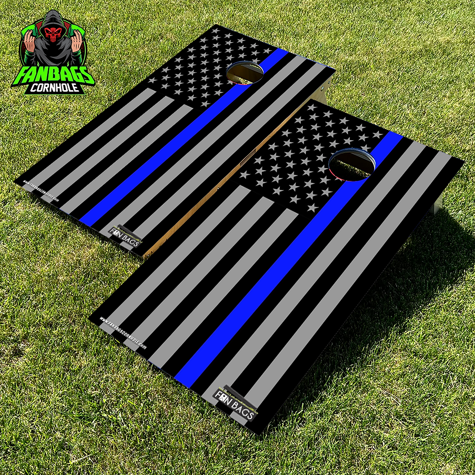 a set of cornhole boards sitting in grass with a thin blue line design