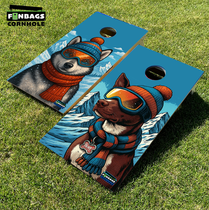 A picture of two dogs wearing snow gear printed on a set of cornhole boards 