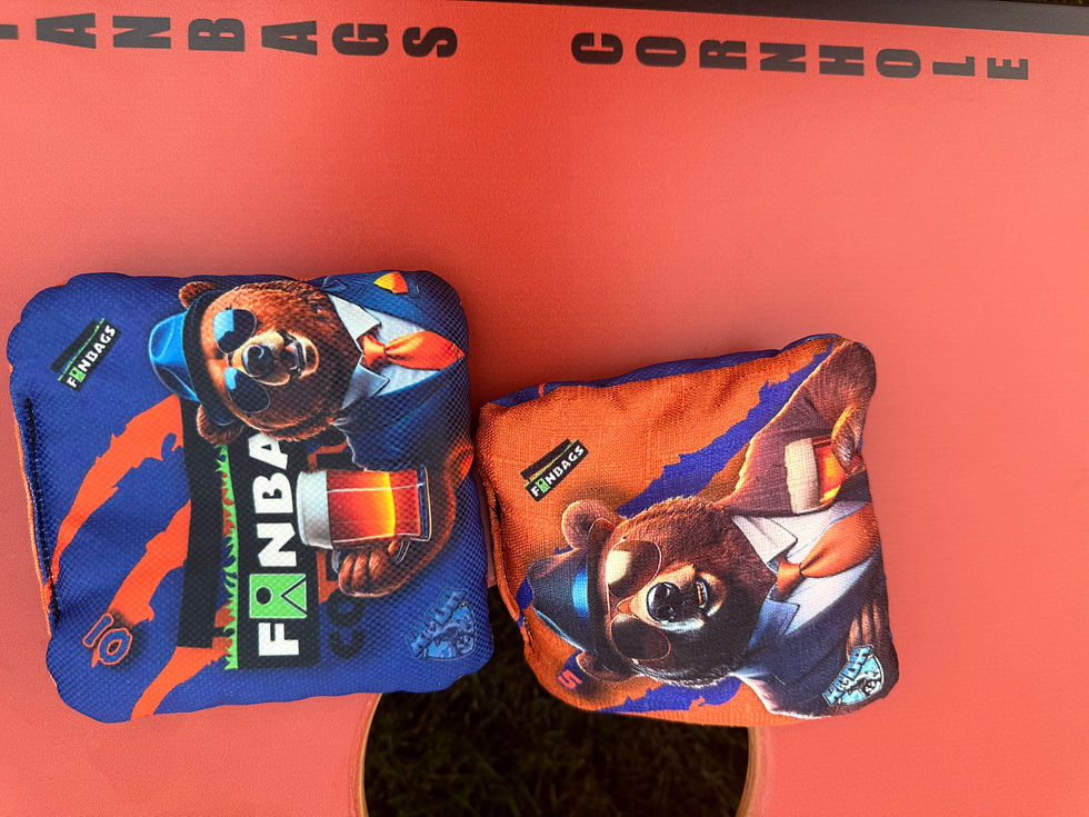 Close-up view of a cornhole bag resting on a wooden board