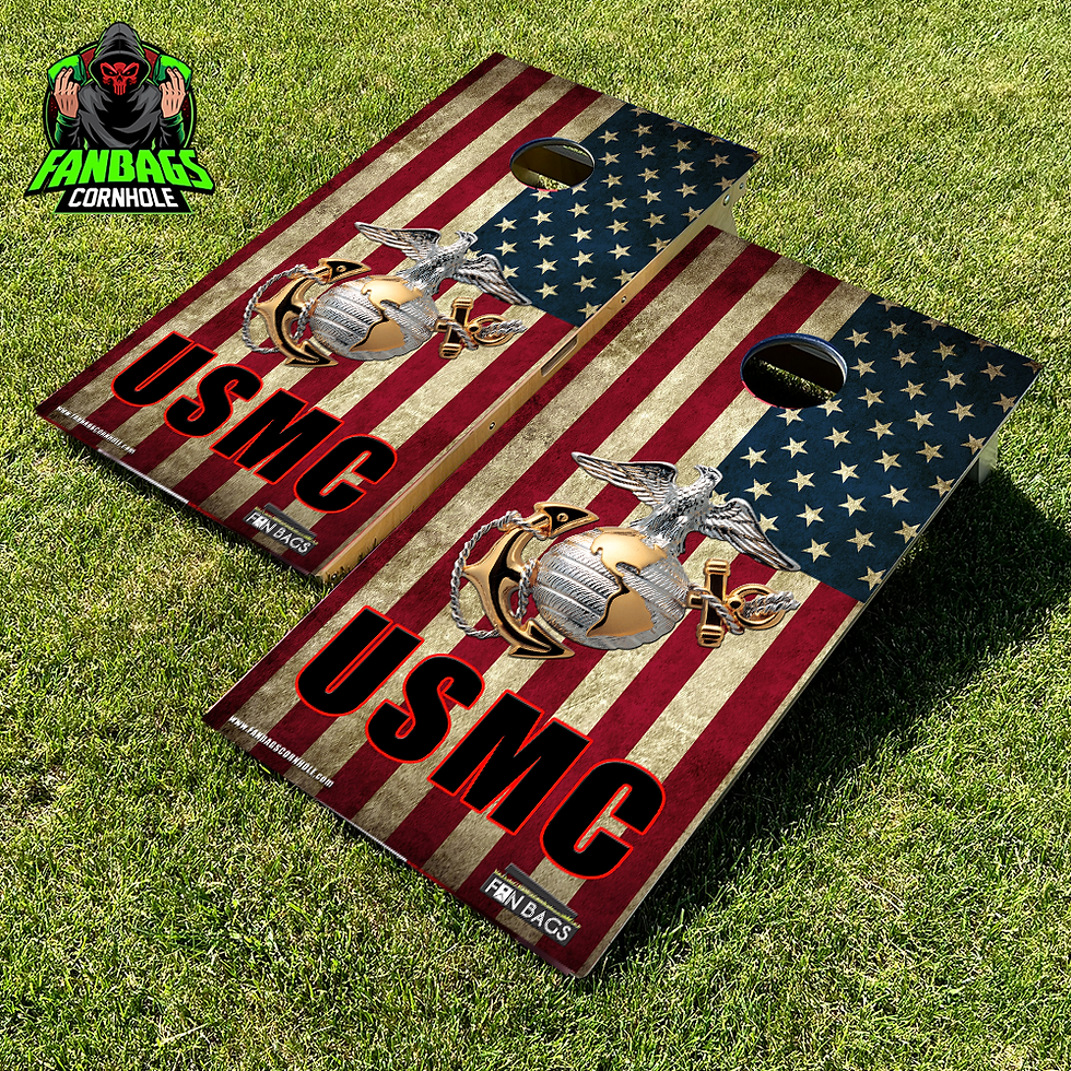 a set of cornhole boards sitting in grass with a marines design