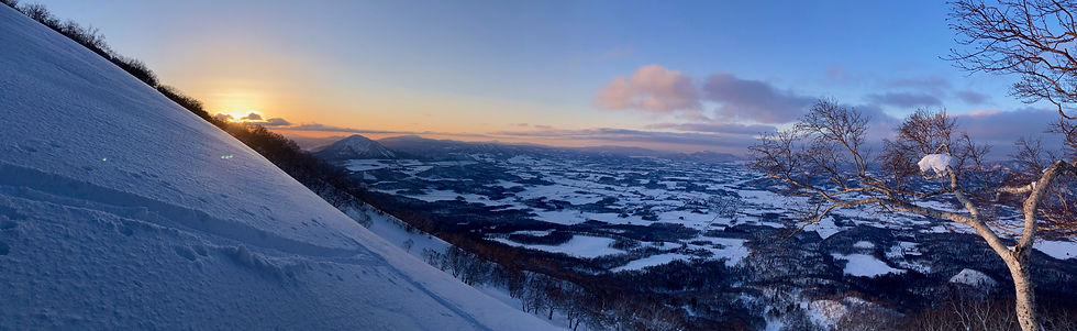 The sunrise seen from the snowy mountains of Niseko