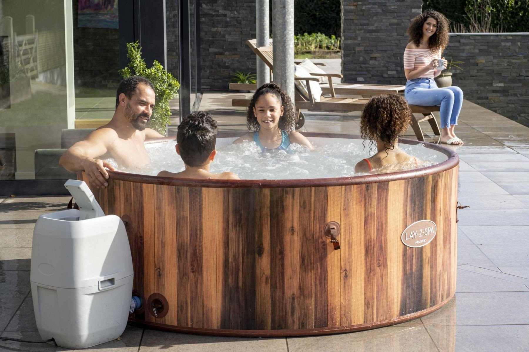 Lay-z-spa Helsinki Hot Tub with 4 people sat in it.