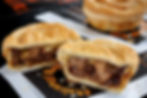 Braised Beef Short Rib Pie with the pie wrapper underneith