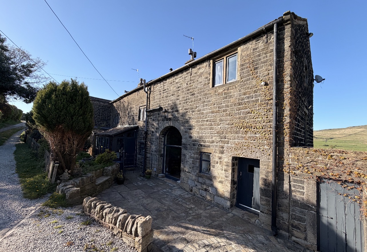 Finished traditional stone property after lime repointing by G & T Pointing and Restoration