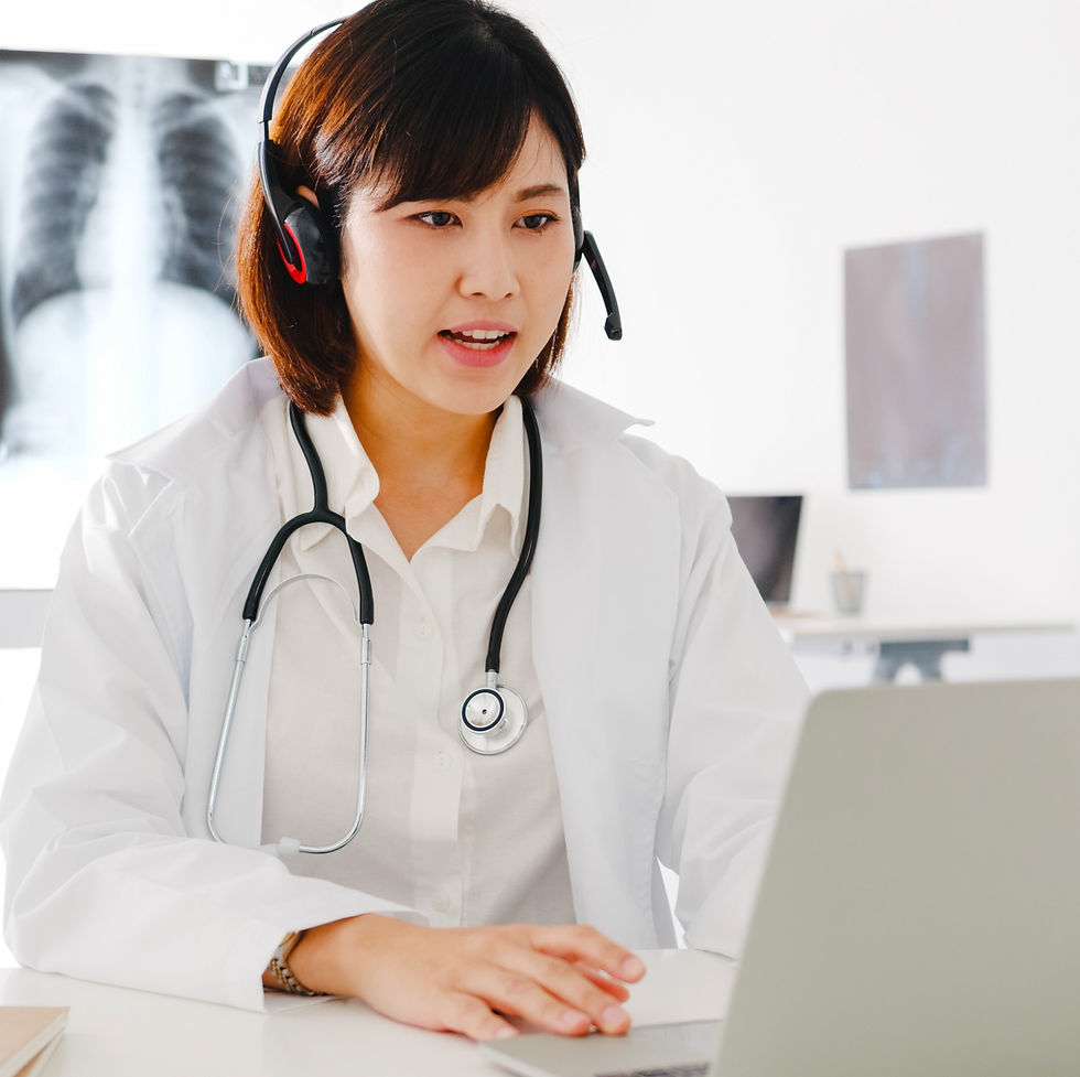 young-asia-female-doctor-white-medical-uniform-with-stethoscope-using-computer-laptop-talk