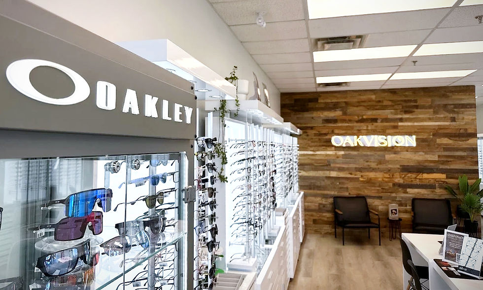 Eye-level view of stylish eyeglasses displayed on a wooden shelf