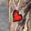Thumbnail: Red enamel heart with black edges