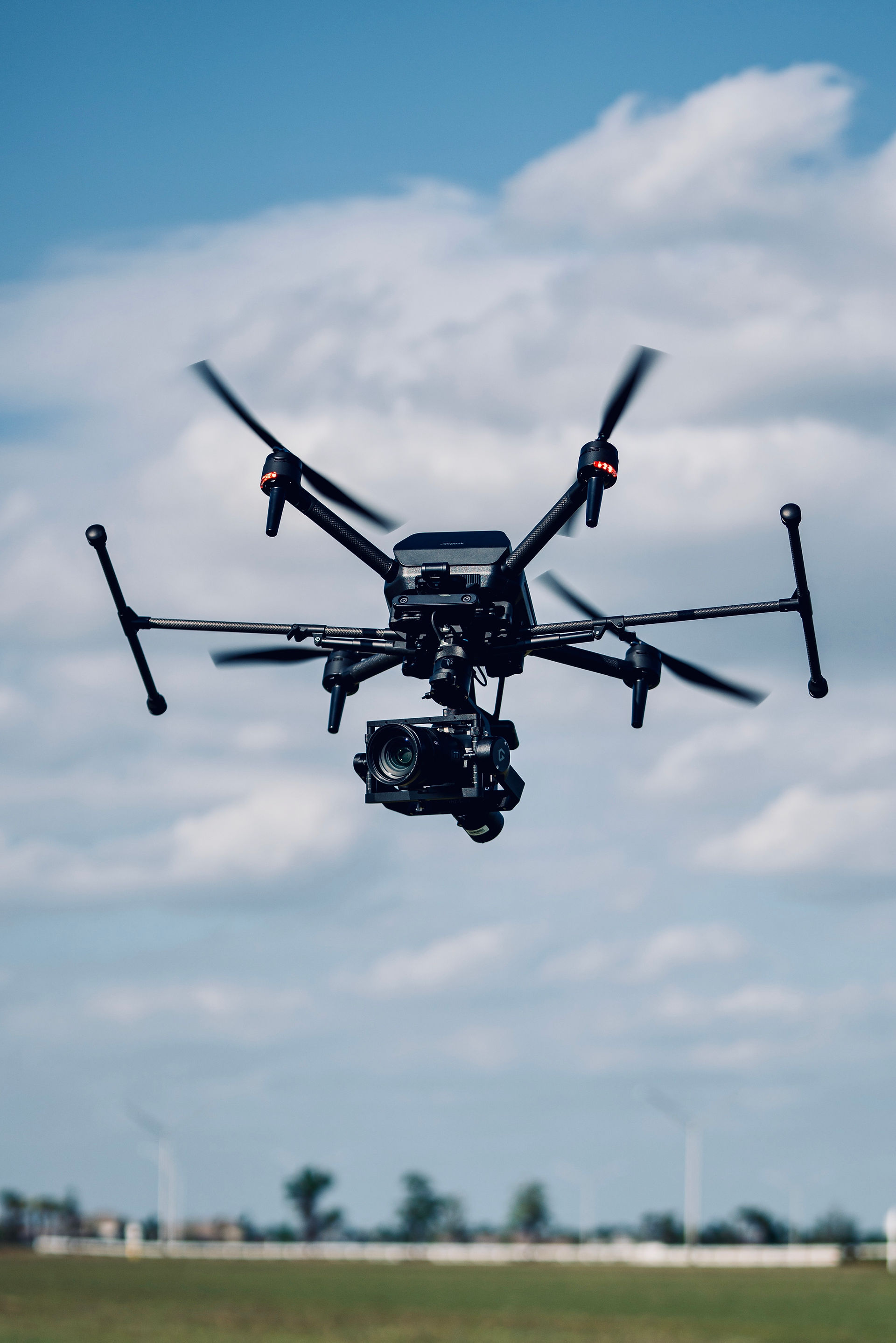 Sony Airpeak S1 drone flying with gimbal-mounted Sony Alpha camera.