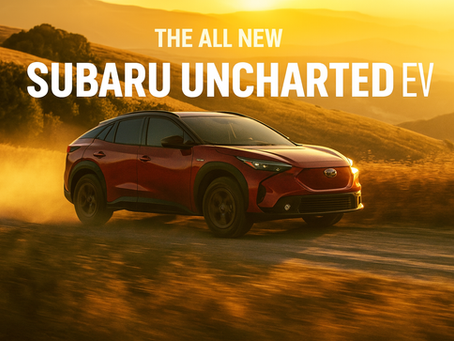 The 2026 Subaru Uncharted EV kicking up dust as it speeds through sunlit golden hills, captured during a cinematic drone shoot by AIRWOLF Drones.