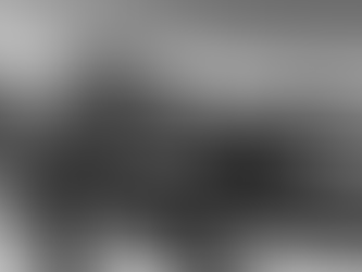 Photographer Nick Dupuy capturing cowboy scene beside pickup truck during Boot Barn Westward campaign filming in Marfa Texas