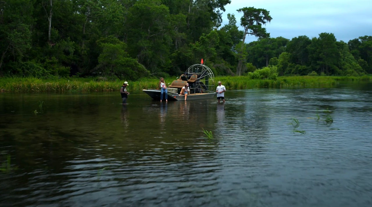 Florida drone production crew filming an airboat commercial on location with professional aerial cinematography.