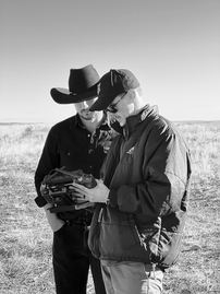 Wolfgang Weber and director Brodie Sweeney reviewing monitor during Boot Barn Westward campaign filming in Marfa Texas