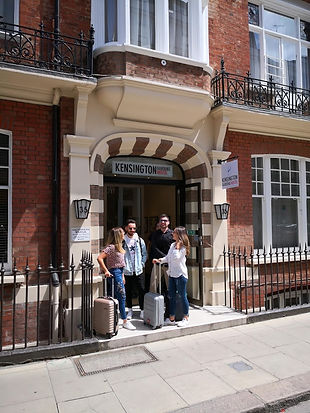 Young people outside Kensington Gardens Hostel