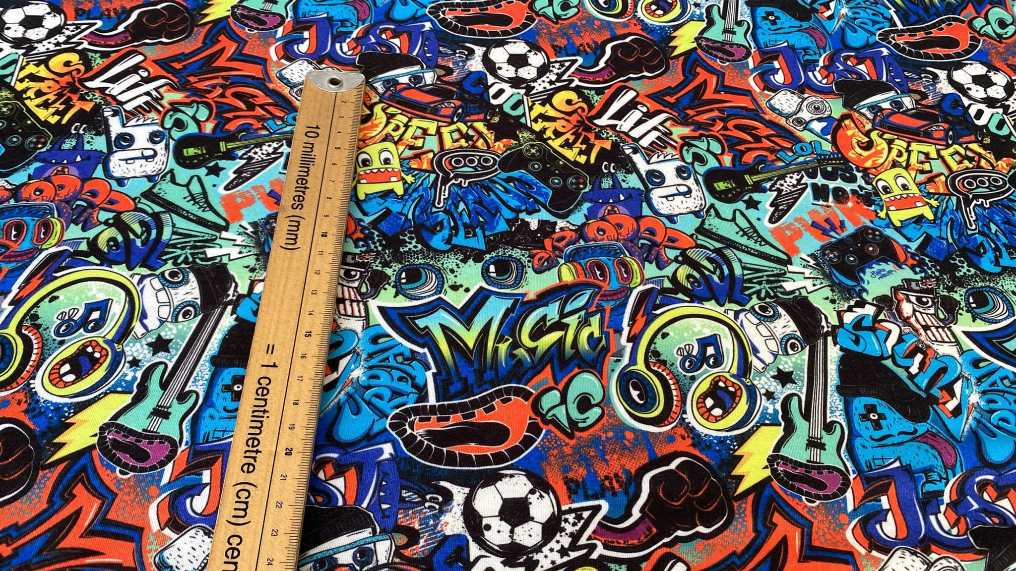 3m for £9 Teen Graffiti Spun Polyester Elastane (WH964)