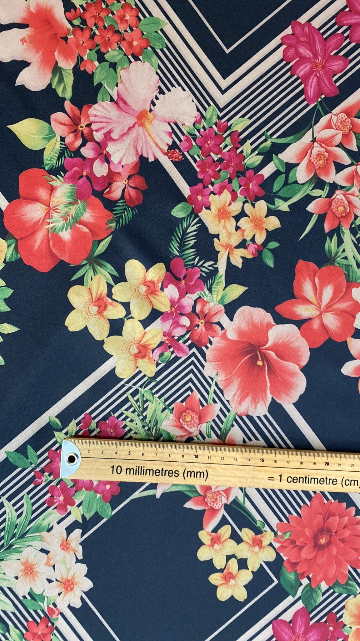 3m for £9 Pink/Red/Yellow Floral with White Geometric Scuba (WH131)