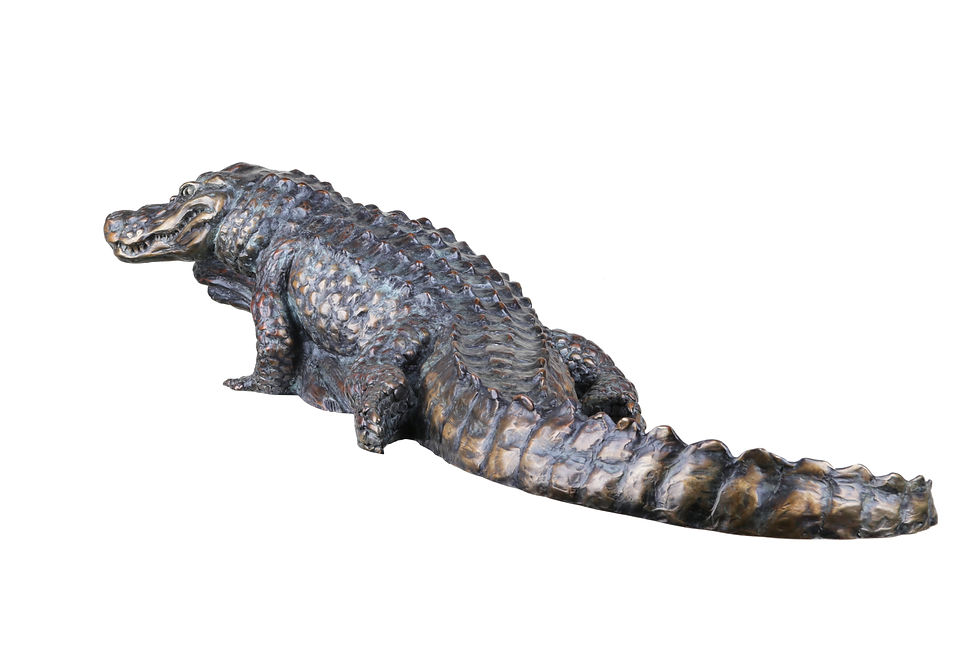 Thumbnail: Bronze sculpture of an alligator resting low to the ground, its textured hide and watchful expression rendered in rich detail