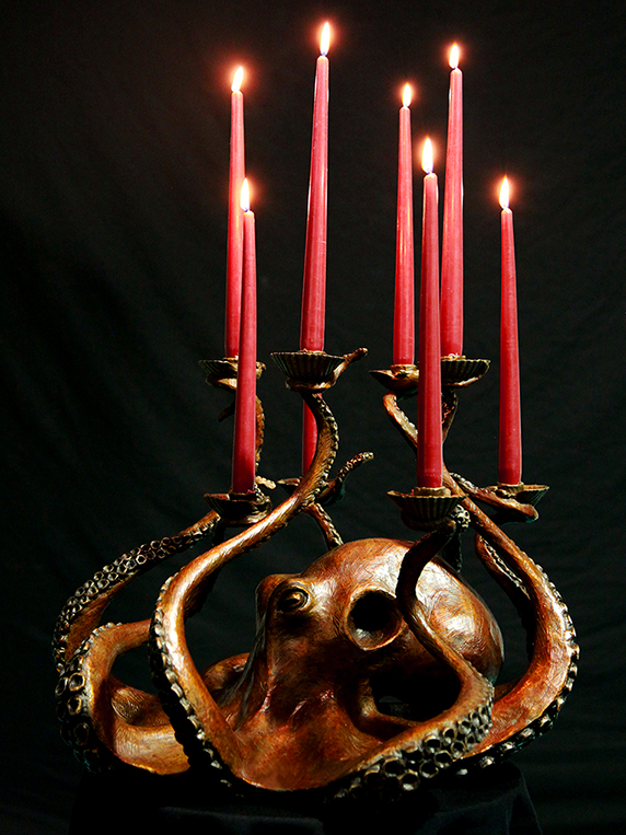 Illuminate Maria Octopus Candelabra bronze sculpture by Geoffrey Smith with candles lit