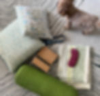 Eye-level view of a yoga mat and cushion in a peaceful room