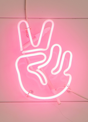 Neon sign holding up two fingers ✌️