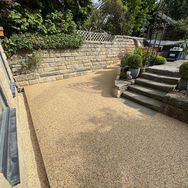 New resin surfacing in garden next to steps