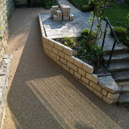 New resin surfacing in garden next to steps