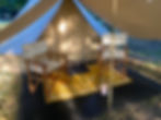 bell tent and directors chairs outside.jpeg
