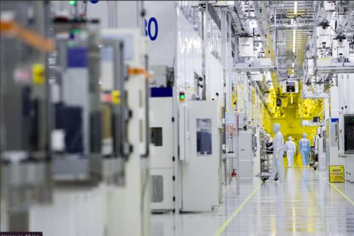 A wide-angle view of Samsung’s expansive research facility with modern architecture, advanced labs, and staff working across multiple high-tech floors.