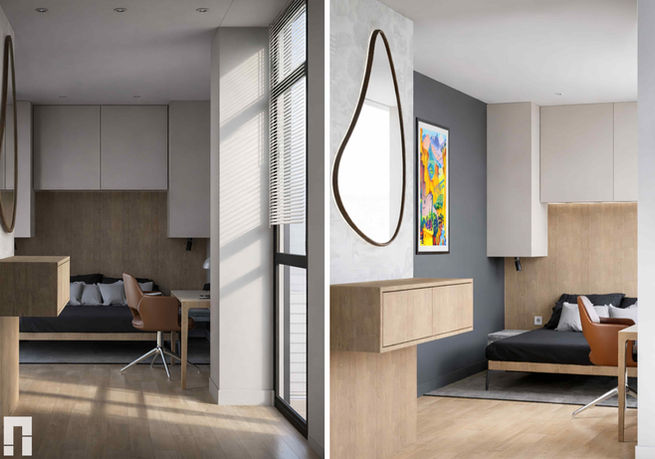 Bedroom interior with workspace, wood furniture, round mirror, modern artwork, bed, and natural light