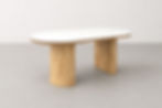 Brozon Oval Sintered Stone Dining Table with white sintered stone top and natural wood pedestal base